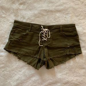 Billabong green distressed mini jean shorts